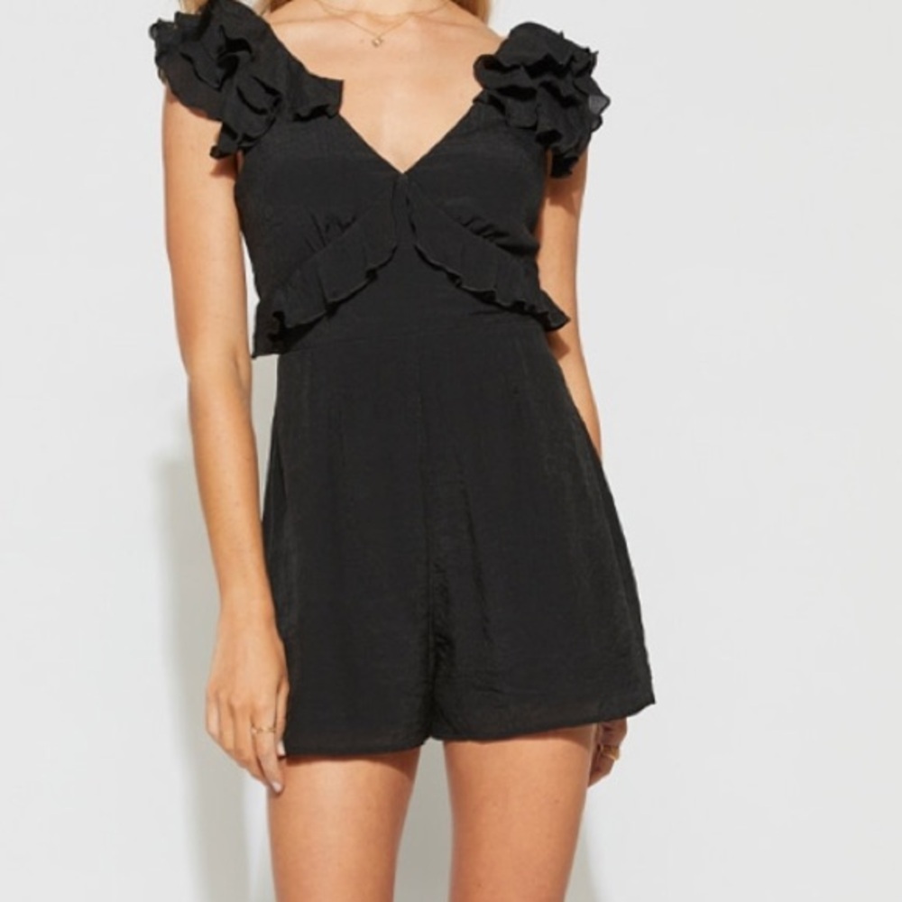 Francesca’s Margot Tiered Flutter Sleeve Romper
